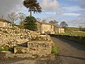 wikimedia_commons=File:Milk churn stand, Winterburn - geograph.org.uk - 619674.jpg