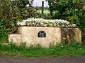 wikimedia_commons=File:Old Milk Churn Stand - near Cilymaenllwyd Church, Login - geograph.org.uk - 1251948.jpg